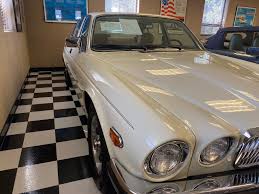 Image result for Nimbus White 1987 Jaguar
