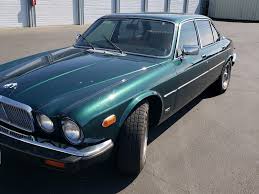 Image result for Poseidon Dark Green 1985 Jaguar