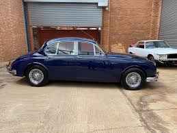 Image result for Dark Blue 1965 Jaguar