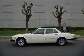 Image result for Nimbus White 1987 Jaguar