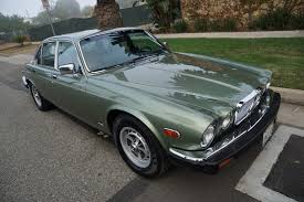 Image result for Poseidon Dark Green 1985 Jaguar