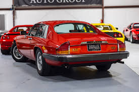 Image result for Sebring Red 1986 Jaguar
