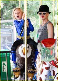 Image result for Queen B by Bumbleride $428 Gwen Stefani and Gavin Rossdale with Kingston and Zuma at the LA zoo