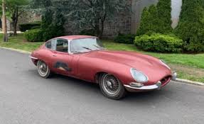 Image result for Maroon 1962 Jaguar