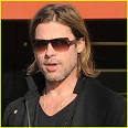 Brad Pitt Walks With A Cane