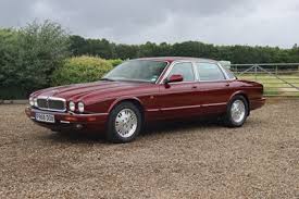Image result for Carnival Red 1996 Jaguar