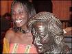 Yvonne Adhiambo Owuor standing by the statue of the late Sir Michael Cane in ... - _39279195_yvonne_caine203ind