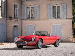 Image result for Sebring Red 1986 Jaguar