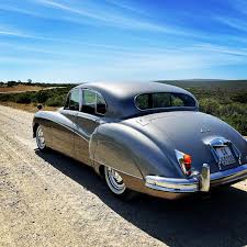 Image result for Silver Blue 1959 Jaguar