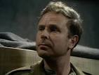 Pat Grant (Edward Hardwicke). Grant is the first Escape Officer at Colditz. - name15