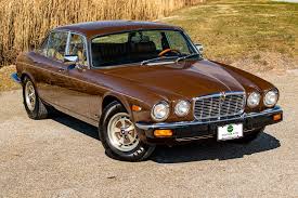 Image result for Carriage Brown 1977 Jaguar