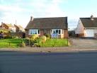 Trowbridge Unitarian Meeting House. A notice board outside the bungalow at - via Daymix