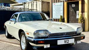 Image result for Glacier White 1988 Jaguar