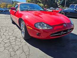 Image result for Phoenix Red 1999 Jaguar