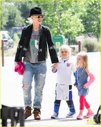 Image result for Queen B by Bumbleride $428 Gwen Stefani and Gavin Rossdale with Kingston and Zuma at the LA zoo