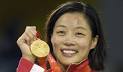 Chinese Canadian, wrestler Carol Huynh, wins Canada's first gold ...