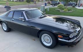 Image result for Jet Black 1988 Jaguar