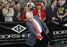 Buffett, Bill Gates play table tennis at annual shareholder meeting