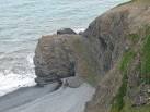 Carreg Ti-Pw (Ti-Pw Rock). The top of the rock is just visible behind the - via Daymix
