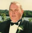 2005. Husband of Carolyn (Johnson) Shea.