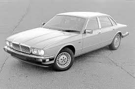 Image result for Nimbus White 1987 Jaguar