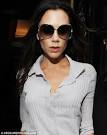 hot Victoria Beckham legs it