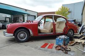 Image result for Maroon 1962 Jaguar