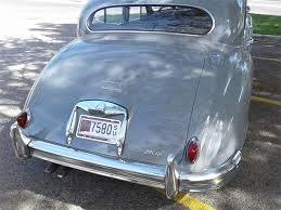 Image result for Silver Blue 1959 Jaguar