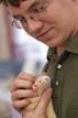 Volunteer Justin Harvey scratches a pet rat. The Wonderful World of Rats, ... - bay006038