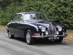 Image result for Dark Blue 1965 Jaguar