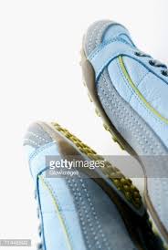 Closeup Of A Pair Of Tennis Shoes Stock Photo | Getty Images