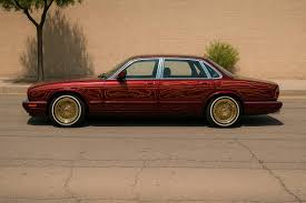 Image result for Phoenix Red 1999 Jaguar