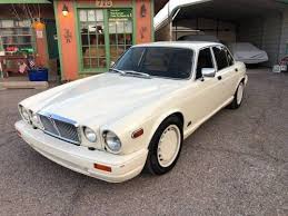 Image result for Nimbus White 1987 Jaguar