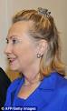 Mrs Clinton seemed happy to wear little make-up and reveal her grey roots as ... - article-1313839-0B431293000005DC-742_224x369