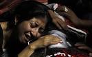A Copt mourning her dead,