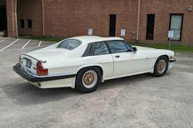 Image result for Glacier White 1988 Jaguar