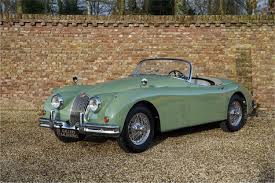 Image result for Dark Green 1959 Jaguar