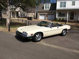 Image result for Nimbus White 1987 Jaguar