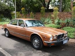 Image result for Carriage Brown 1977 Jaguar