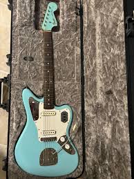 Image result for Turquoise 1973 Jaguar