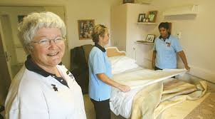 PAY INCREASE: Caregivers Heather Milnes, left, Gwen Burt and Solita Devi are happy in their workplace. - 474923