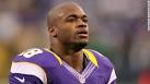 Vikings star Adrian Peterson turns himself in, freed on bail - CNN.com