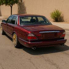 Image result for Phoenix Red 1999 Jaguar