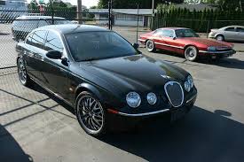 Image result for Black Cherry 2006 Jaguar