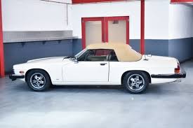 Image result for Nimbus White 1987 Jaguar