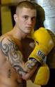 Ricky Burns of Scotland stopped former champion Nicky Cook of England in the ... - GD8882543