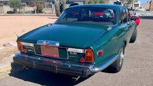 Image result for Poseidon Dark Green 1979 Jaguar