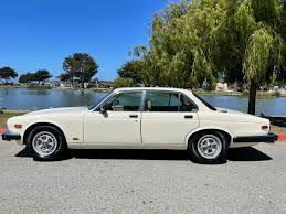 Image result for Nimbus White 1987 Jaguar