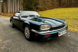 Image result for Bright Turquoise 1995 Jaguar