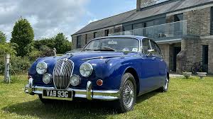 Image result for Light Blue 1968 Jaguar
